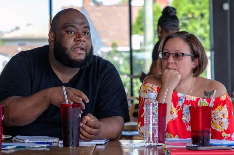 qushaun_and_jennifer_at_airport_rage_mtg-ord.jpg